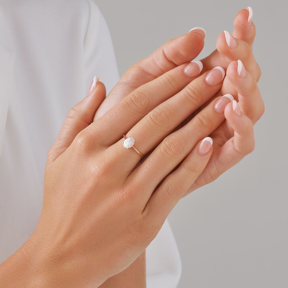 Australian Opal Solitaire Ring in 10kt Yellow Gold