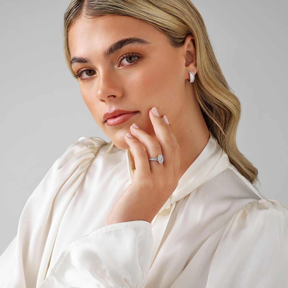 0.30 Carat TW Oval Shaped Cluster Halo Diamond Ring in 10kt White Gold