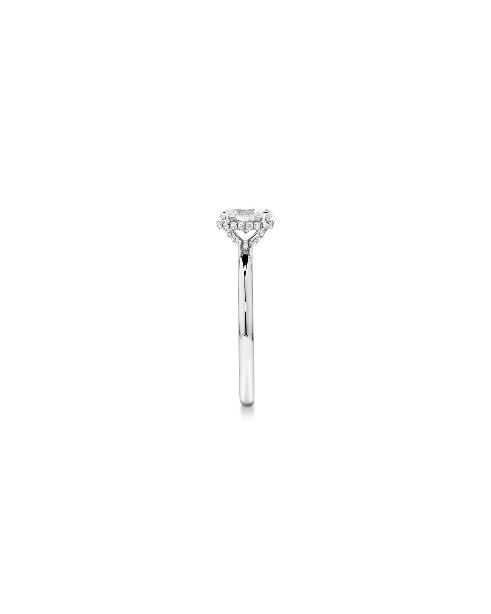 0.68 Carat TW Oval Cut Diamond Solitaire Hidden Pave Halo Engagement Ring in Platinum